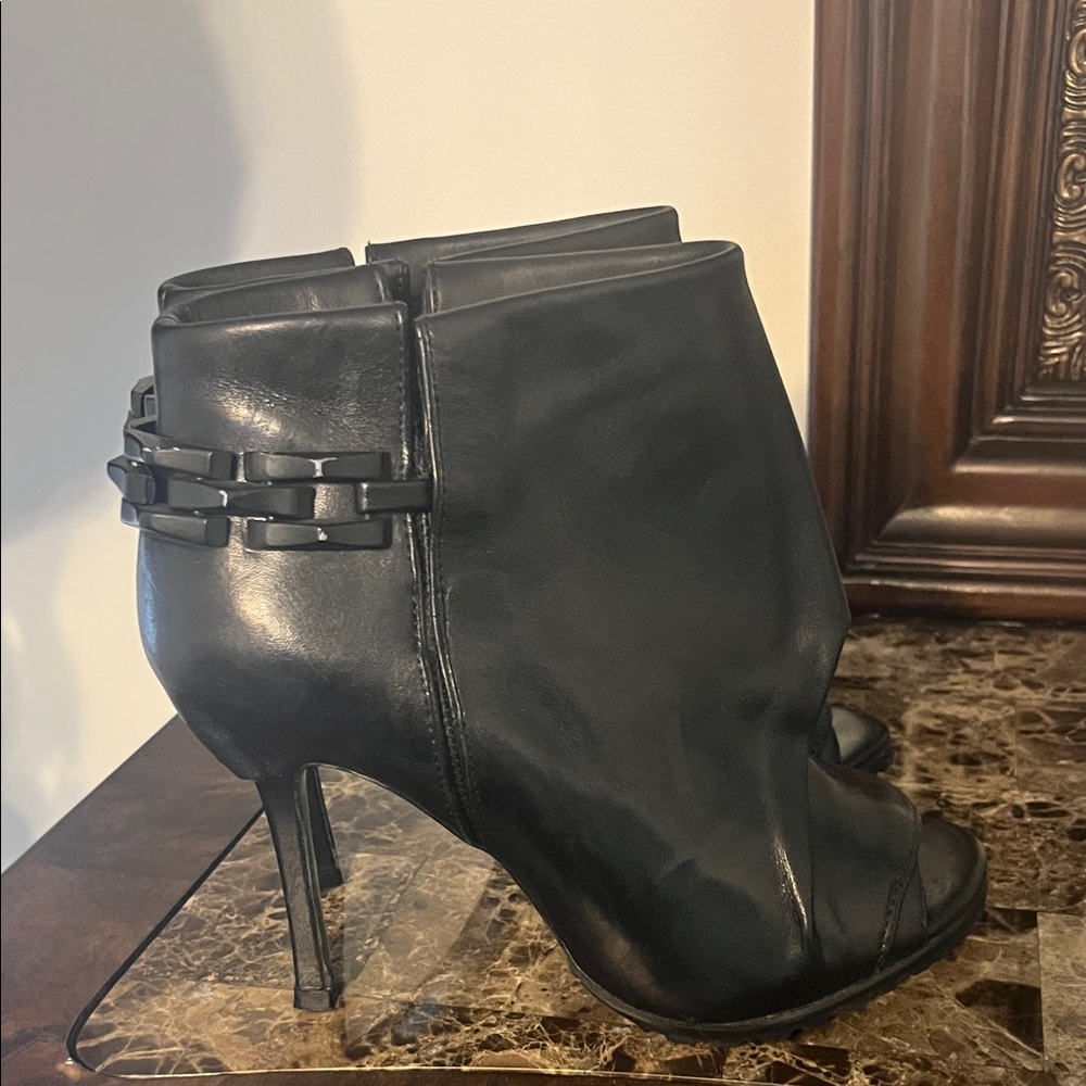 Chic Black Leather Heeled Ankle Boots. In excellent condition. Only worn once